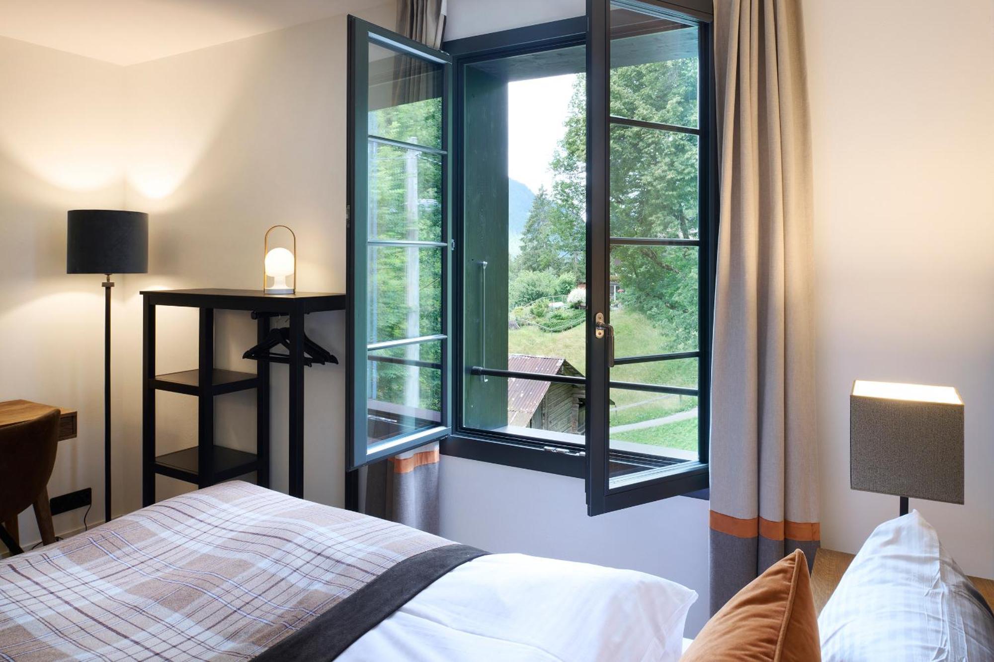 Eiger View Alpine Lodge กรินเดลวัลด์ ภายนอก รูปภาพ